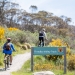 People cycling along the Thredbo Valley Track