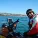 Scientist completing a hydrographic survey using a jet-ski mounted single-beam echosounder at Mereweather Beach, Newcastle. 