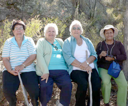 Committee members Margie Leslie, Betty Niddrie, Aunty Sylvia Trindall and Aunty Maureen Sulter at the Yaminba lookout seating at Sandstone Caves.