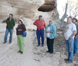 Committee members, community guests and local DECC staff inspecting upgraded walking track at Sandstone Caves