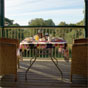 Outdoor dining at Tuckers Rock Cottage, Bongil Bongil National Park (Image: DECC) Outdoor dining at Tuckers Rock Cottage, Bongil Bongil National Park (Image: DECC)