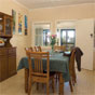 Dining area at Tuckers Rock Cottage, Bongil Bongil National Park (Image: DECC) Dining area at Tuckers Rock Cottage, Bongil Bongil National Park (Image: DECC)