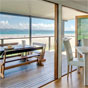 Dining area, Imeson Cottage in Cape Byron State Conservation Area (Image: David Young/DECCW) Dining area, Imeson Cottage in Cape Byron State Conservation Area (Image: David Young/DECCW)