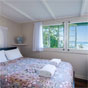 Partridge Cottage bedroom, Cape Byron State Conservation Area (Image: David Young/DECCW) Partridge Cottage bedroom, Cape Byron State Conservation Area (Image: David Young/DECCW)