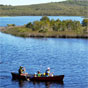 Canoeing on Lake Arragan, Angourie to Brooms Head section of the Yuraygir Coastal Walk (Image: Debra Novak/DECCW) Canoeing on Lake Arragan, Angourie to Brooms Head section of the Yuraygir Coastal Walk (Image: Debra Novak/DECCW)