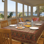 Dining on the deck at Green Point Cottage in Sydney Harbour National Park (Image: Michael van Ewijk/DECCW) Dining on the deck at Green Point Cottage in Sydney Harbour National Park (Image: Michael van Ewijk/DECCW)