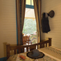 Bedroom in Yarrangobilly Caves House, Kosciuszko National Park (Image: Michael van Ewijk/DECCW) Bedroom in Yarrangobilly Caves House, Kosciuszko National Park (Image: Michael van Ewijk/DECCW)