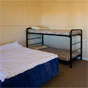 Bedroom in accommodation, Willandra National Park (Image: Boris Hlavica/DECCW) Bedroom in accommodation, Willandra National Park (Image: Boris Hlavica/DECCW)