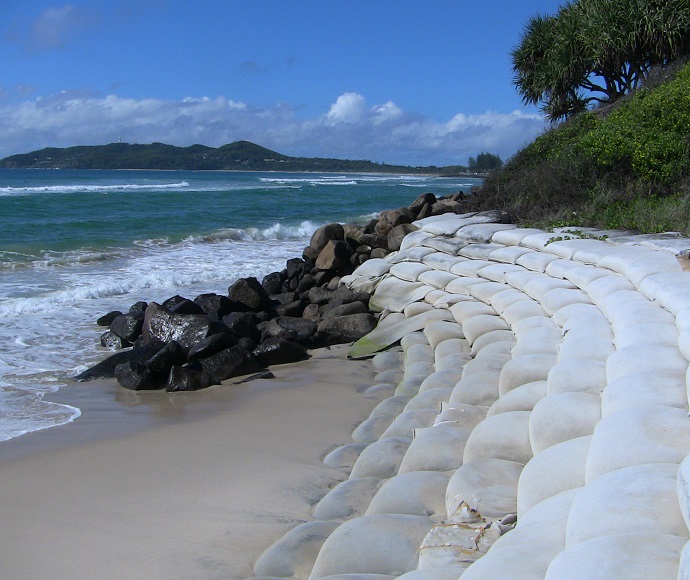 Sandbags on an eroded beach