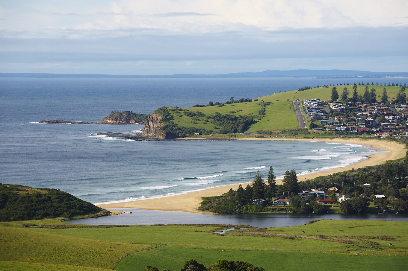 View over paddocks to the estuary and coast at Gerringong NSW