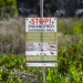 Sign on a beach warning visitors that there are shorebirds nesting in the area.