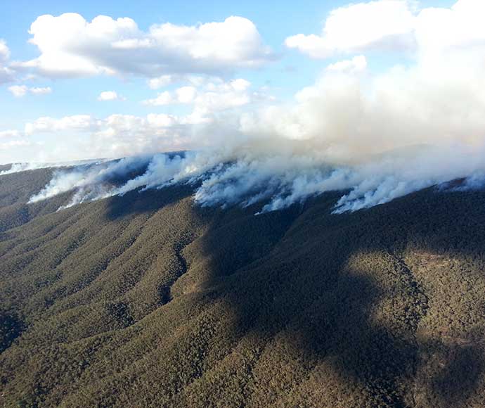 Aerial Incendiary Hazard reduction smoke plume in Brindabella National Park