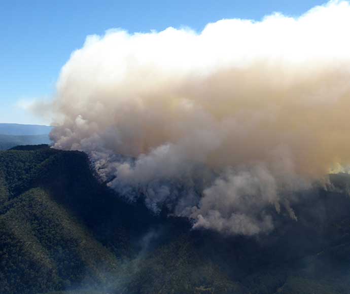 Aerial Incendiary hazard reduction smoke plume Kittys Creek in Guy Fawkes National Park