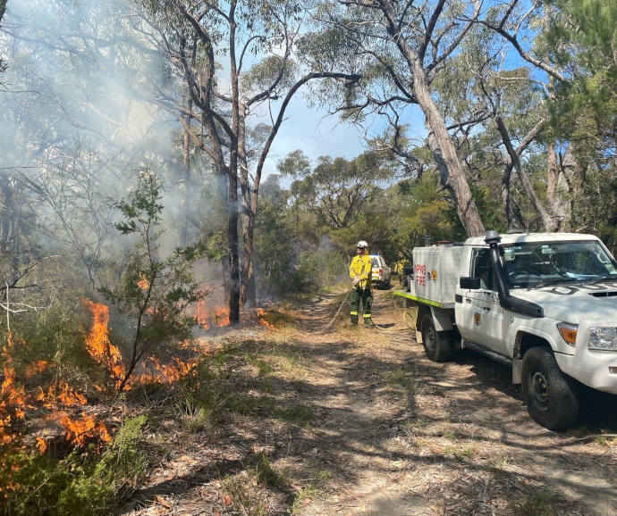 NPWS hazard reduction burn with firefighters and truck