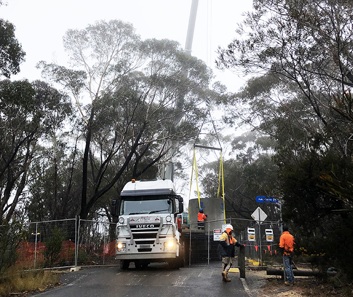 Crane operations over mature trees to construct new toilet block 
