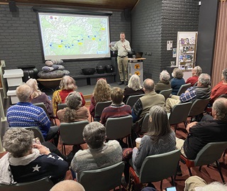 Glenn Storrie addressing a community briefing at the Dorrigo Rainforest Centre