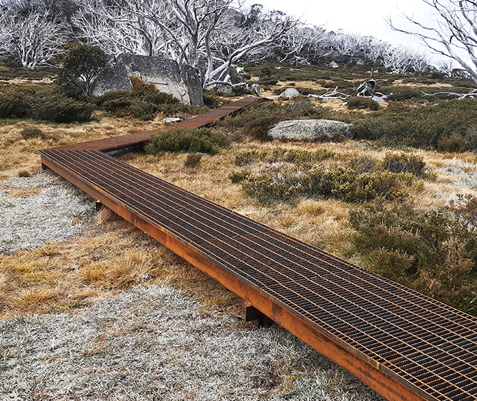 Steel mesh walkway on stage 3 of the Snowies Iconic Walk between Charlotte Pass and Perisher Valley