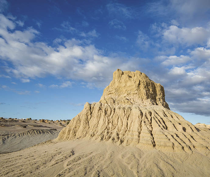 The Walls of China are dramatic formations of sand and silt deposited over tens of thousands of years and sculpted by wind and erosion in Mungo National Park.