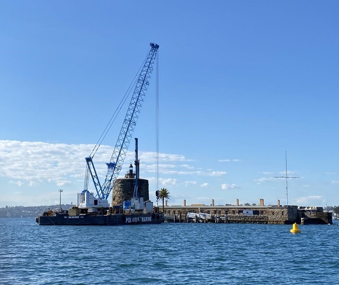 Piling works at Fort Denison during the day.