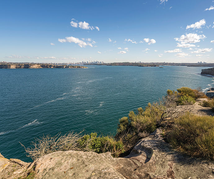 Views from Fairfax Lookout along the Fairfax Walk at North Head in Manly at Sydney Harbour National Park. The views extend back to the Sydney city.