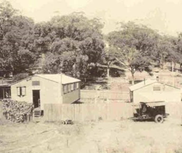The barracks, mess, amenities, and generator of the 61st Anti-Aircraft Searchlight Company during its occupancy of Nielsen Park, circa 1944