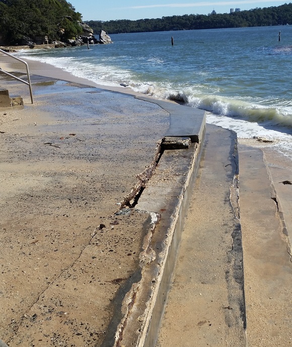 Damaged concrete step along seawall at Nielsen Park, Sydney Harbour National Park