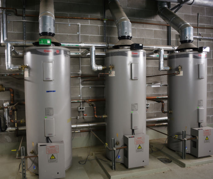 Gas indoor water heater tanks for supply of hot water to commercial building