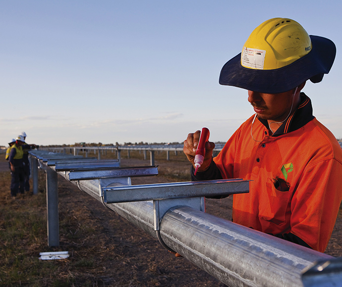 Workers during set up at Moree Solar Farm. Moree, NSW.