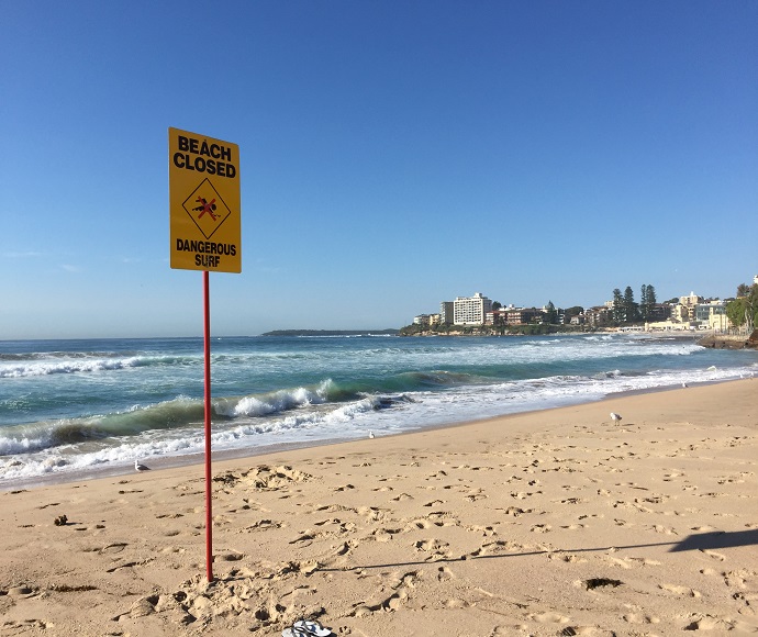 Lifeguards close the beach if conditions are dangerous for swimmers. Look for beach closure signs.