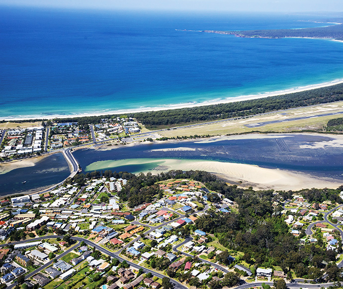 Aerial image of Merimbula looking onto Merimbula Bay. Merimbula, NSW