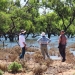 Department of Planning and Environment and University of Canberra staff observe the inundation extents from the air and on the ground at Lake Muloga