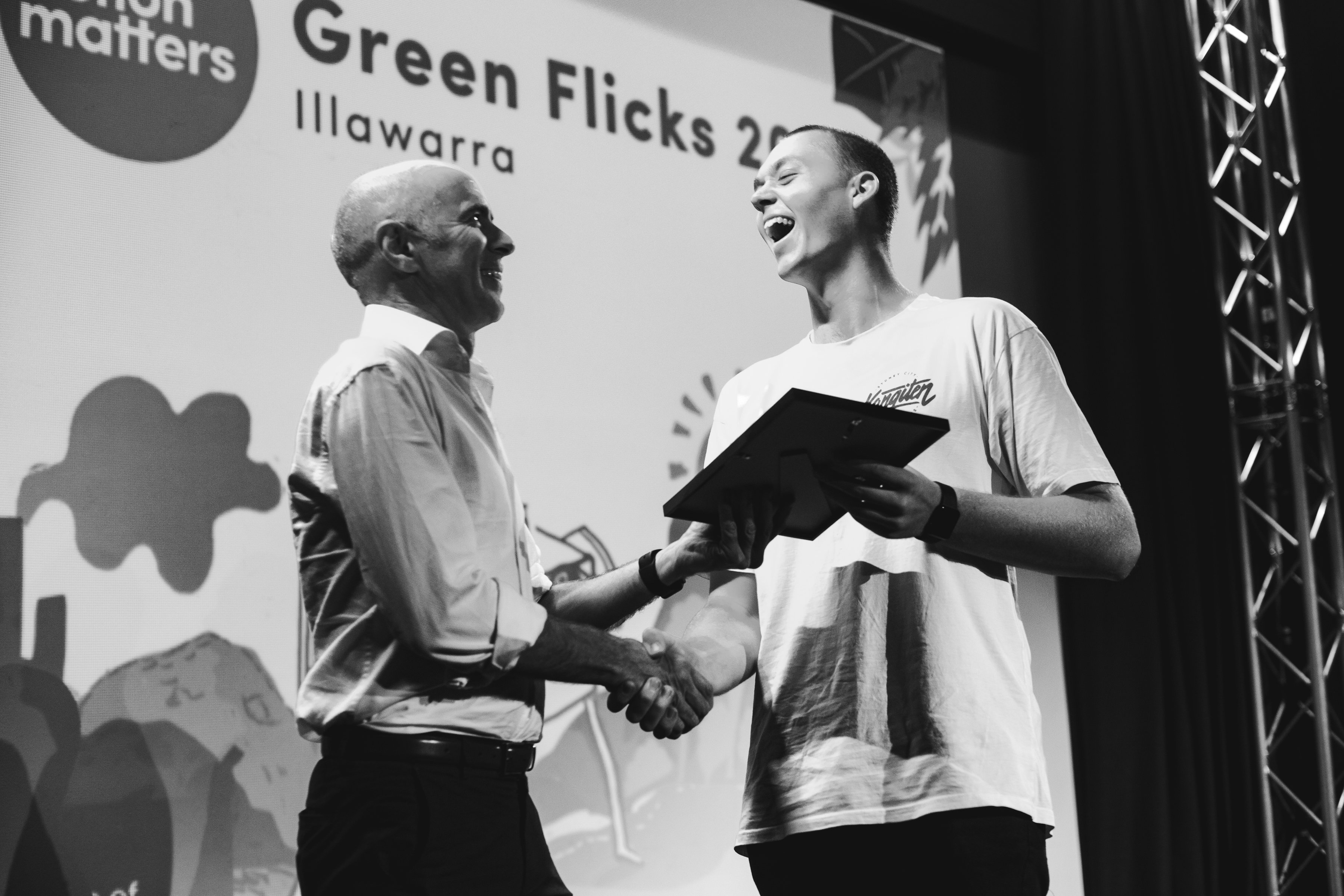 Person speaking on stage