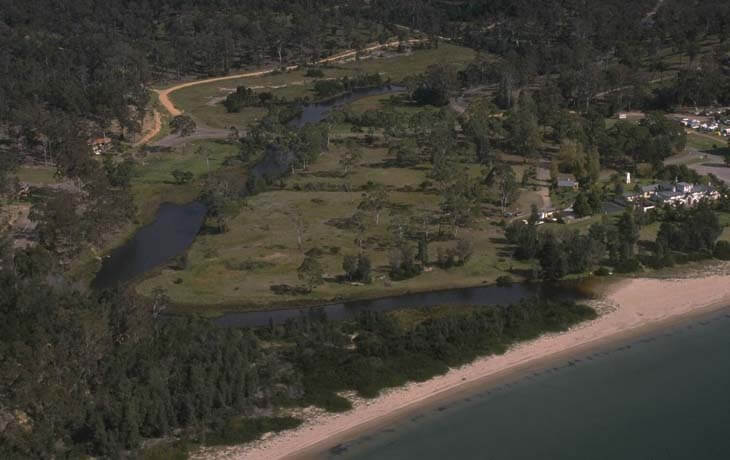 A view of Boydtown Creek flowing through forest toward Nullica Beach near the historic Boydtown