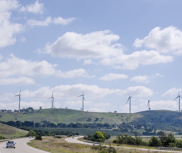 Landscape view of road and wind farm on the horizon at Bungedore NSW