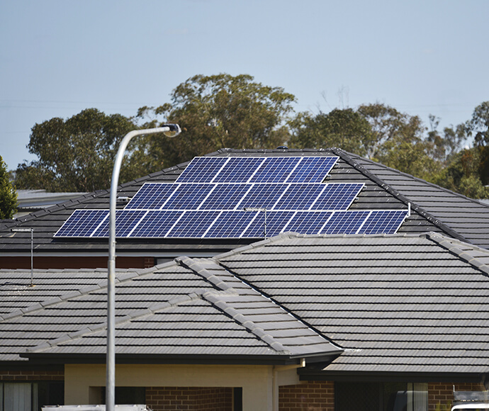 Solar panels on the roof or a suburban house in Glenfield, South West Sydney, NSW