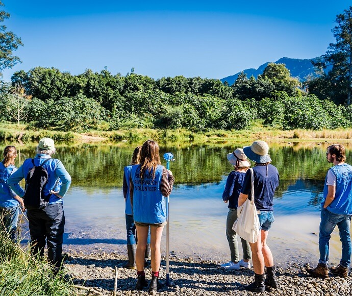 Bellingen Riverwatch volunteer citizen scientists standing on the river's edge