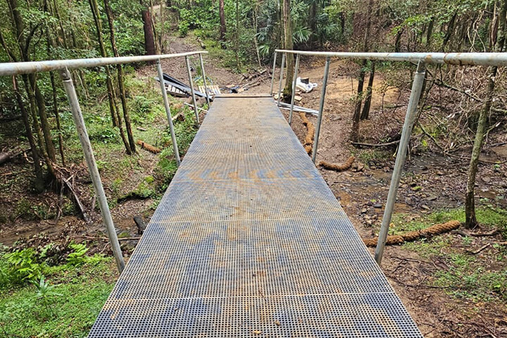 A metal bridge descending