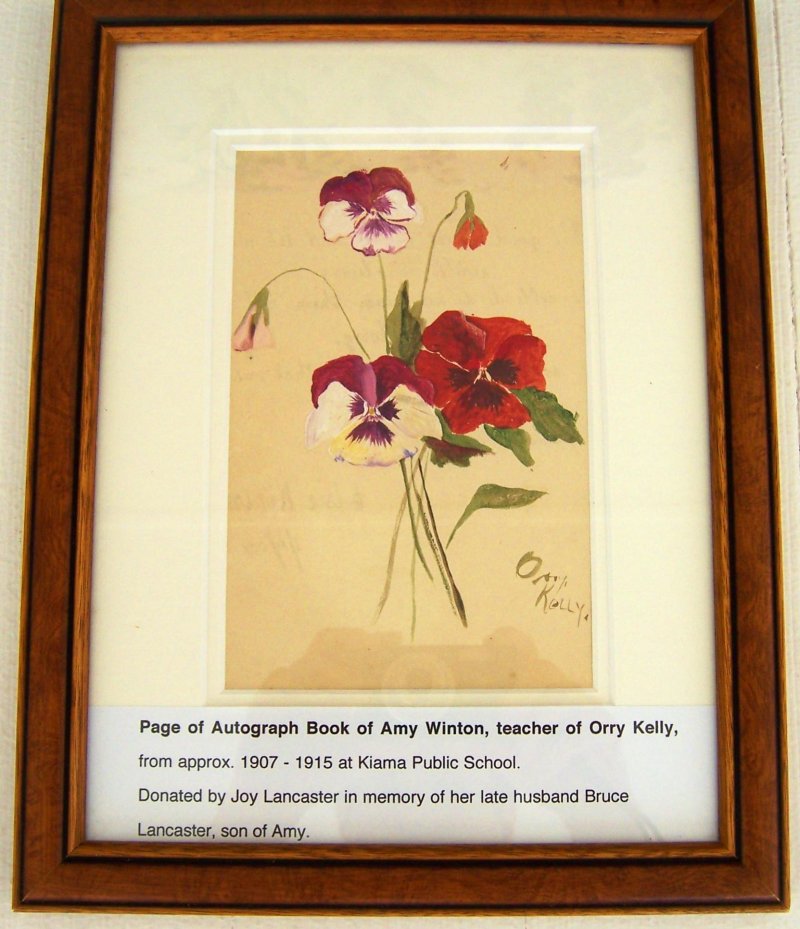 Childhood drawing by Orry-Kelly, created during primary school, featuring red and white flowers.