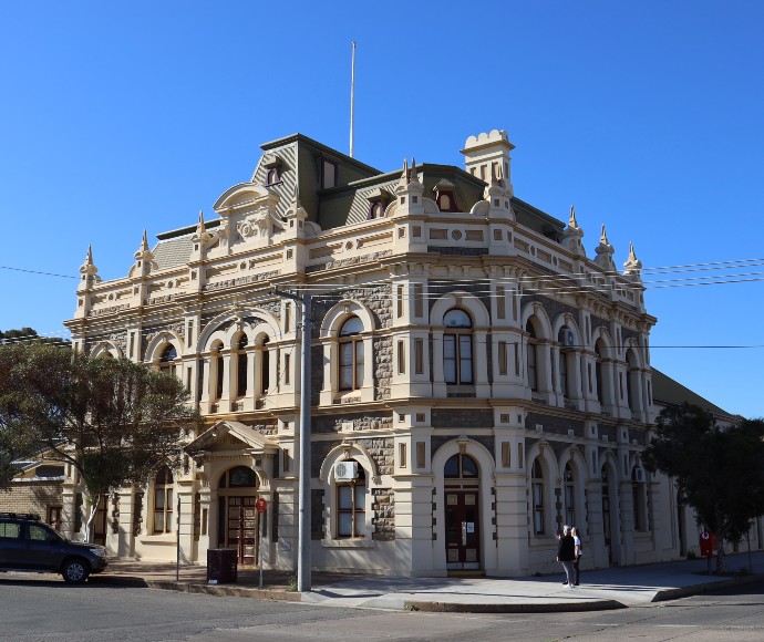 Historic Broken Hill Trades Hall building with a blue sky background