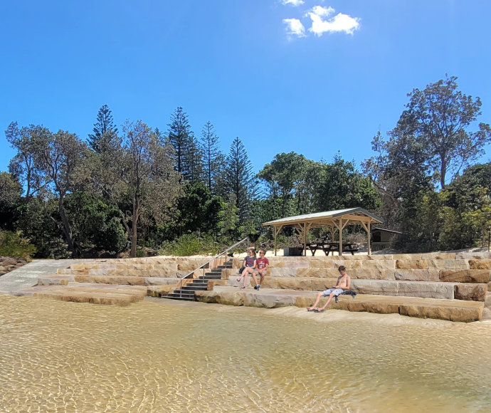 Artist's impression of proposed works at Trial Bay foreshore showing new ramp, bleachers, shelter and upgraded rock sea wall