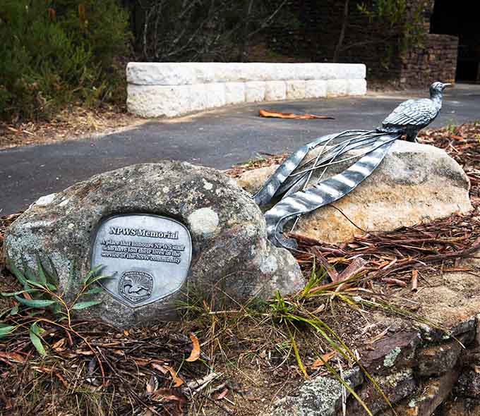 Bird sculpture and carved stone