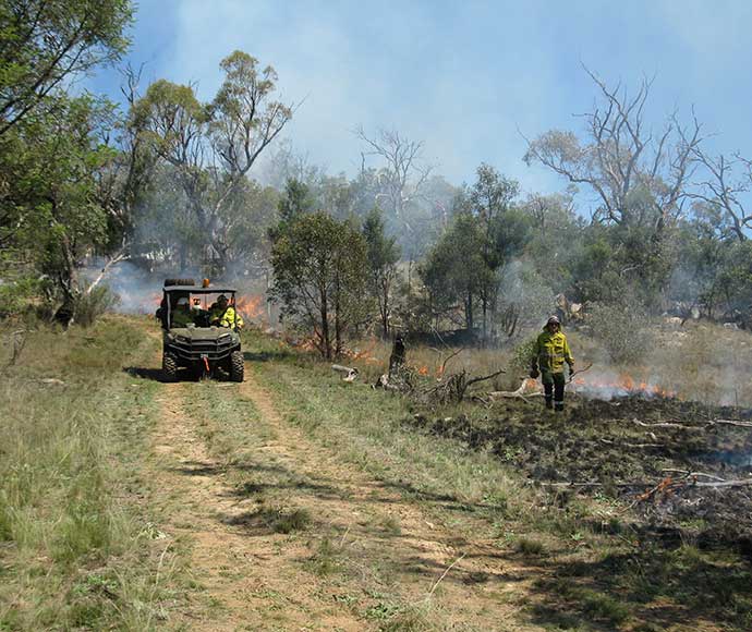 ATV quad and fire personnel Wild Woman Ridge hazard reduction all terrain vehicle used for fire