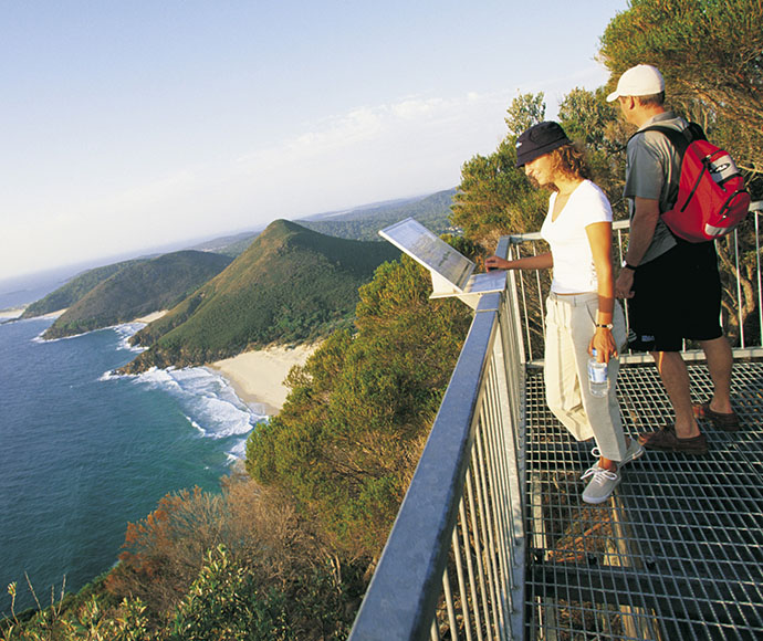 Couple at Tomaree Head lookout, views south to Zenith Beach, Wreck Beach and Box Beach, Port Stephens